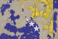 Bosnia and Herzegovina flag depicted in paint colors on old obsolete messy concrete wall closeup. Textured banner on rough Royalty Free Stock Photo