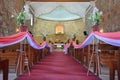 Bosoboso church interior with bench seat in Antipolo City, Philippines