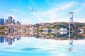 The Bosphorus bridge, the Ortakoy Mosque and the skyscrappers on the background, Istanbul Royalty Free Stock Photo