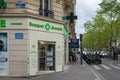 Bosquet Grenelle Pharmacy building facade along the street in La Fleche, Paris, France