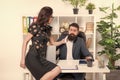 Boss employee romance. Romantic relationship with boss. Sexy woman flirt with bearded man. Romantic partnership. Couple Royalty Free Stock Photo