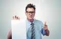 Boss in glasses holding a paper. You signed a contract concept. Royalty Free Stock Photo