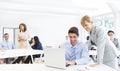 A Boss Guiding Employee in Front of the Laptop Royalty Free Stock Photo