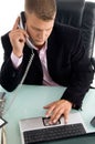 Boss holding the phone receiver and working Royalty Free Stock Photo