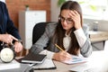 Boss reminding young woman of duration in office