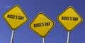 Boss's Day - three yellow signs with blue sky background