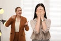 Boss screaming at employee in office. Toxic work