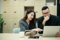 Boss and secretary Reviewing the schedule and tasks to be considered today. Royalty Free Stock Photo