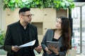 Boss and secretary Reviewing the schedule and tasks to be considered today. Royalty Free Stock Photo