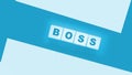 The boss sign on a wooden cubes on black. Business owner concept