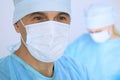 Boss surgeon is examining the operation while medical team are busy of patient. Medicine, healthcare and emergency in Royalty Free Stock Photo