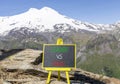 Boss vs leader symbol. Concept words Boss vs versus leader on beautiful black chalk blackboard. Beautiful mountain Elbrus