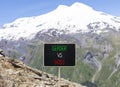 Boss vs leader symbol. Concept words Boss vs versus leader on beautiful black chalk blackboard. Beautiful mountain Elbrus