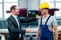 Boss and worker in conversation Royalty Free Stock Photo