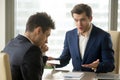 Boss yelling at employee for missing deadline, bad work results Royalty Free Stock Photo