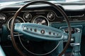 BOSCHENHOOFD/NETHERLANDS-JUNE 11, 2018: interior and dash board of a classic ford mustang at a classic car meeting Royalty Free Stock Photo