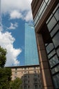 Boston blue  modern  tower beside constrating skyscrapers Royalty Free Stock Photo