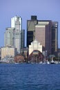 Boston Harbor and the Boston skyline at sunrise as seen from South Boston, Massachusetts, New England Royalty Free Stock Photo