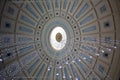 Boston, MA - April 8 2021: Artistic round ceiling in the Quincy Market building. Lights hanging down from the dome