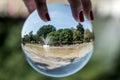 Boston, MA, USA 06.09.2017 Crystal ball view on People Enjoy Cooling Spray at Frog Pond on hot summer day public Park Royalty Free Stock Photo