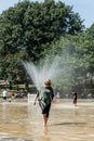 Boston, MA, USA 06.09.2017 - Families Children and People Enjoy Cooling Spray at Frog Pond on hot summer day public Park Royalty Free Stock Photo