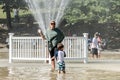 Boston, MA, USA 06.09.2017 - Families Children and People Enjoy Cooling Spray at Frog Pond on hot summer day public Park Royalty Free Stock Photo