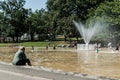 Boston, MA, USA 06.09.2017 - Families Children and People Enjoy Cooling Spray at Frog Pond on hot summer day public Park Royalty Free Stock Photo