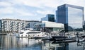 Luxury yachts and boats in the harbor in front of the Institute of Contemporary Art Museum in Boston Seaport.