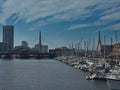 Boston Massachusetts skyline over water with sailboats and Boston Zakim bridge