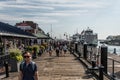 04.09.2017 Boston Massachusetts USA- People everyday life families and boats moored pier long wharf center of Boston Royalty Free Stock Photo