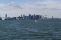 Boston Skyline with airplane landing