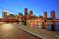 Boston Skyline with Financial District and Boston Harbor at Dusk Royalty Free Stock Photo