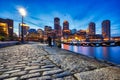 Boston Skyline with Financial District and Boston Harbor at Dusk Royalty Free Stock Photo