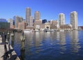 Boston skyline and harbor with boats and Atlantic Ocean on the foreground Royalty Free Stock Photo