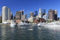 Boston skyline and harbor with boats, kayaks and Atlantic Ocean on the foreground Royalty Free Stock Photo