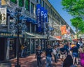 Locals enjoying a sunny day shopping at Faneuil Hall Marketplace in downtown Boston
