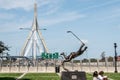 BOSTON, USA 06.09.017 statue the goal Bobby Orr ice hokey player in front of Leonard Zakim Bunker Hill Memorial Bridge