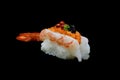 Botan ebi sushi or Spacial premium king shrimp sushi mixed by ikura and caviar top on Japanese rice. Japanese tradition food Royalty Free Stock Photo