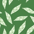Botanic seamless pattern with simple doodle green leaf ornament. Green background