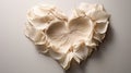 Botanical Elegance. Rose petals in the shape of a heart are delicately placed on a neutral background. Valintines day