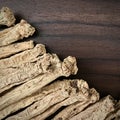 Codonopsis Roots on wooden brown background. Square photo image. Royalty Free Stock Photo