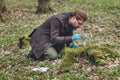 Botanist collecting moss samples