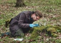 Botanist studying moss samples