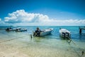 Botes anchored on the beach at Los Roques National Park Royalty Free Stock Photo