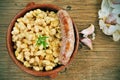 Botifarra amb mongetes, fried white beans and sausage typical of