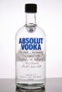 Bottle of Absolut Vodka against light background with back lighting Royalty Free Stock Photo