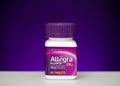 Bottle of Allegra against purple background