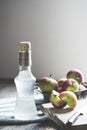 Bottle of apple cider vinegar on rustic background Royalty Free Stock Photo