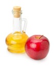 Bottle of apple vinegar and apple