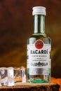 Bacardi rum bottle on black and orange background Royalty Free Stock Photo